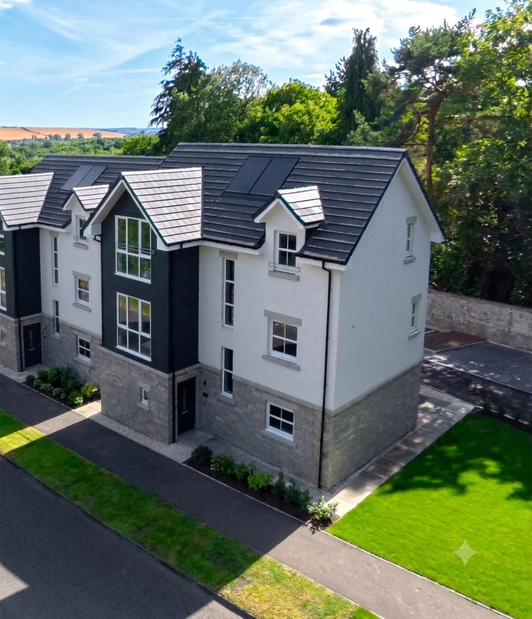 A Naturi Homes development: modern white-render and stone townhouses with dark slate roofs, set among mature trees